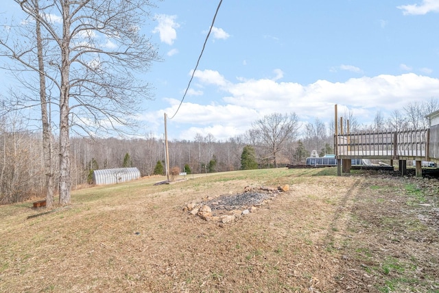 view of yard featuring a view of trees