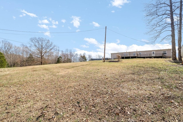 view of yard with a deck