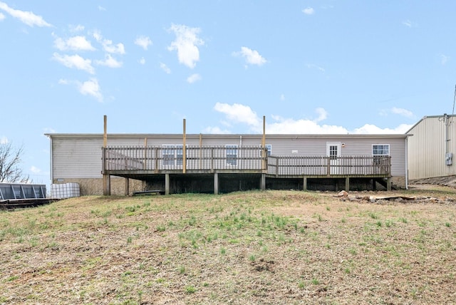 rear view of house with a deck