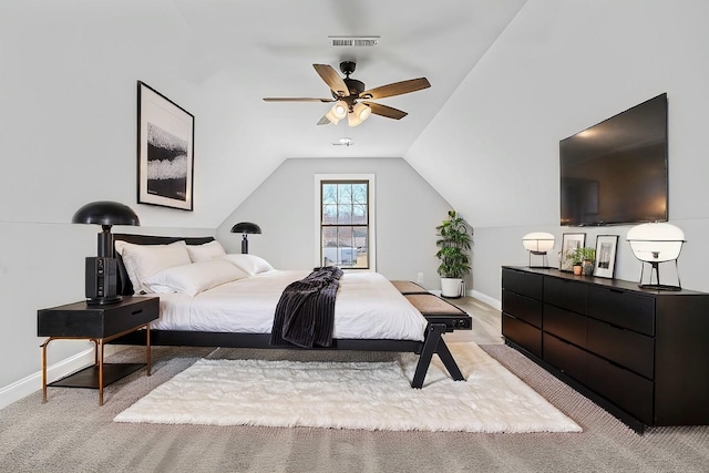 bedroom featuring vaulted ceiling, a ceiling fan, visible vents, and baseboards