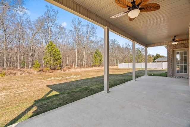 view of patio / terrace featuring fence and a ceiling fan