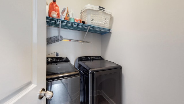 laundry room featuring laundry area and washing machine and clothes dryer