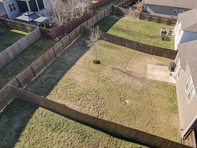 view of yard featuring a fenced backyard