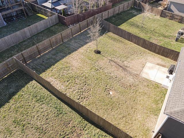 exterior space featuring a fenced backyard