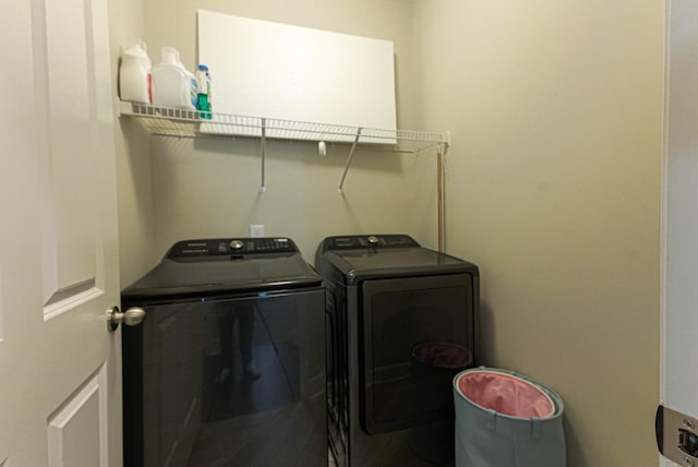 laundry area with laundry area and washing machine and clothes dryer