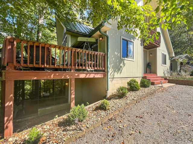 view of home's exterior with metal roof