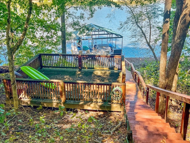 deck featuring a water view