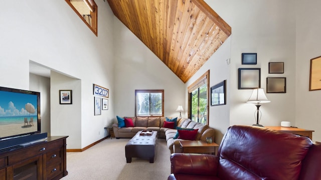 living area with a high ceiling, wood ceiling, light colored carpet, and baseboards