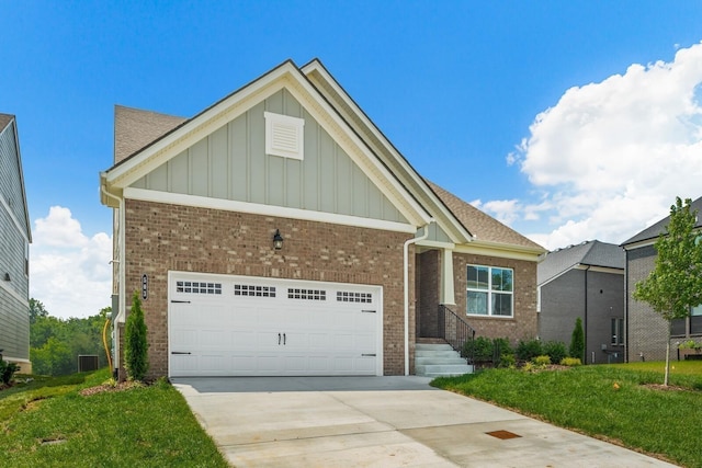 craftsman-style home featuring brick siding, concrete driveway, an attached garage, board and batten siding, and a front yard