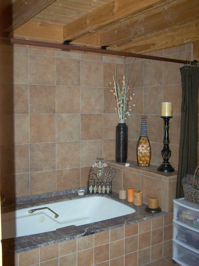 interior details featuring tiled bath