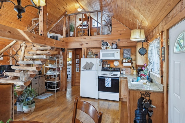 kitchen with light wood-type flooring, white appliances, wooden ceiling, and a sink