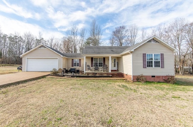 ranch-style home featuring an attached garage, covered porch, concrete driveway, crawl space, and a front lawn