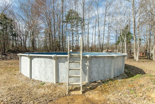 view of outdoor structure featuring an outdoor pool