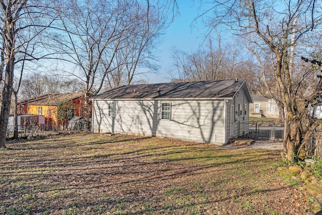 view of yard featuring a gate and fence