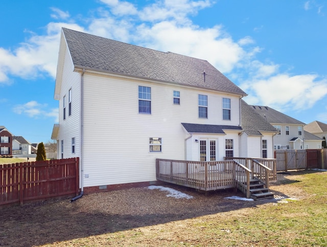 rear view of house featuring a fenced backyard, a yard, roof with shingles, crawl space, and a wooden deck