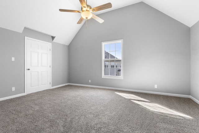 bonus room featuring lofted ceiling, carpet, baseboards, and a ceiling fan