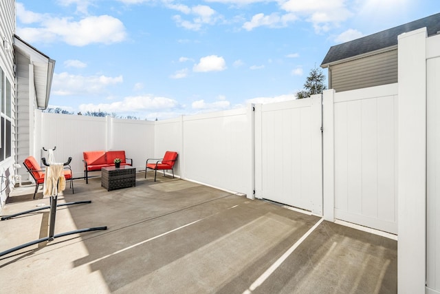 view of patio with an outdoor hangout area and a fenced backyard