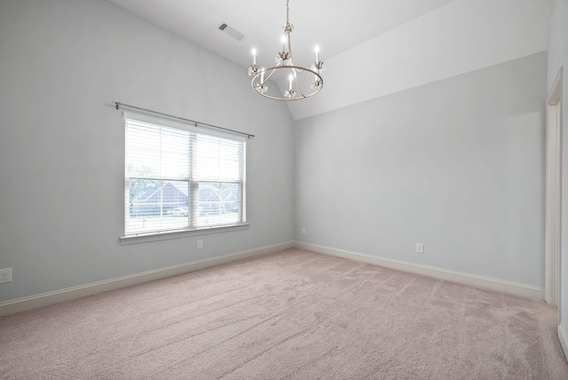 unfurnished room with lofted ceiling, light colored carpet, visible vents, an inviting chandelier, and baseboards