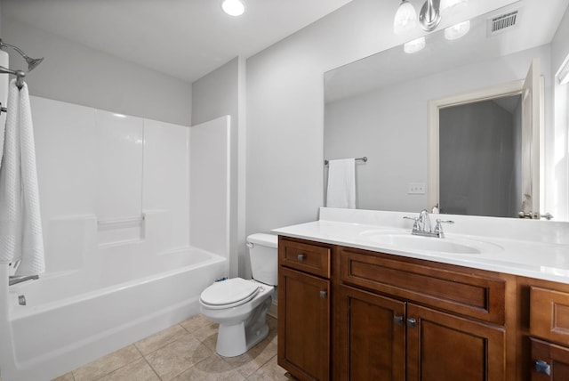 full bathroom featuring visible vents, toilet, vanity, tile patterned floors, and shower / bathtub combination