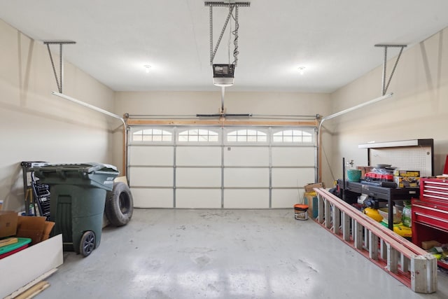 garage featuring a garage door opener