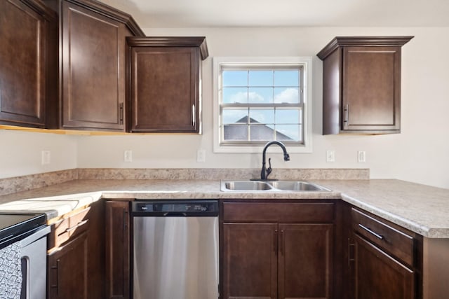 kitchen featuring a sink, dark brown cabinets, dishwasher, and light countertops