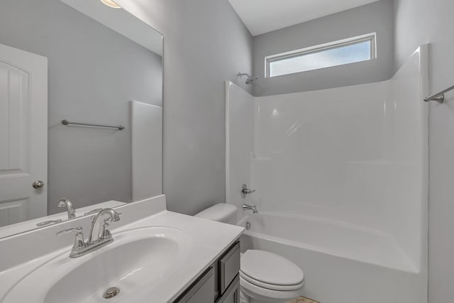 full bath with vanity, toilet, and shower / bathtub combination