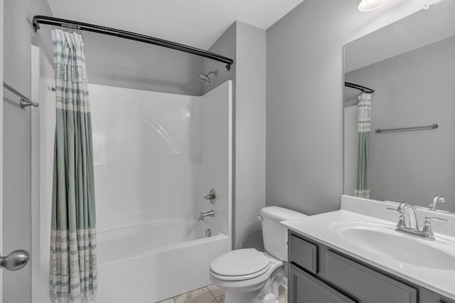 full bathroom with shower / bath combo, vanity, and toilet