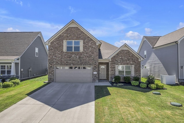 view of front facade featuring driveway, a garage, a front yard, and brick siding