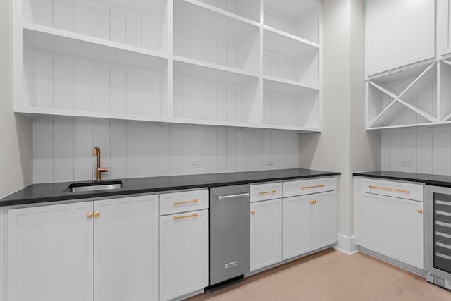 kitchen featuring light wood-style flooring, open shelves, a sink, wine cooler, and white cabinets