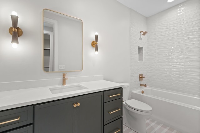 bathroom with vanity, toilet, and shower / bath combination