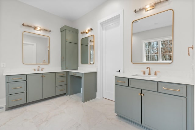 full bath with a sink, two vanities, and marble finish floor