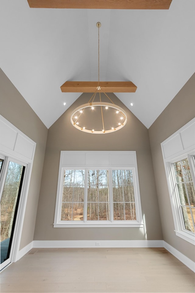 room details with an inviting chandelier, recessed lighting, wood finished floors, and baseboards