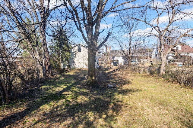 view of yard with fence