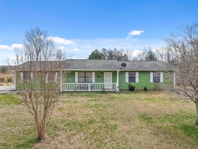 single story home with covered porch and a front lawn