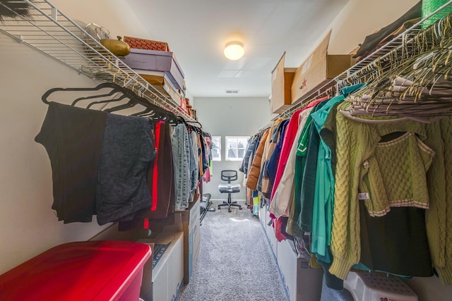 spacious closet with carpet and visible vents