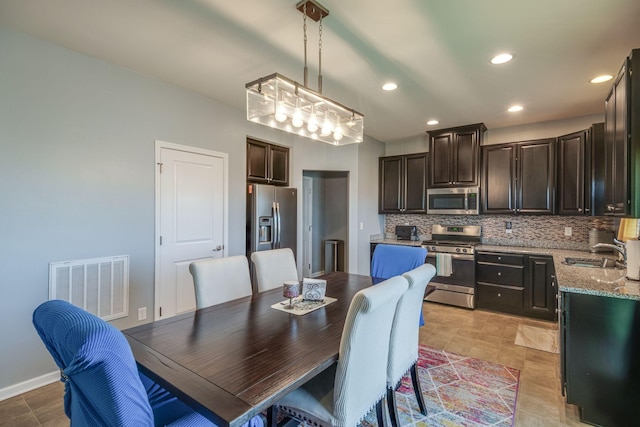 dining area featuring recessed lighting, visible vents, and baseboards