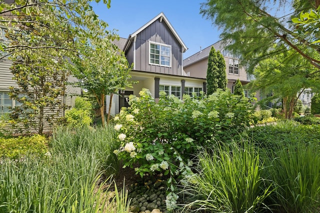 view of property exterior with board and batten siding