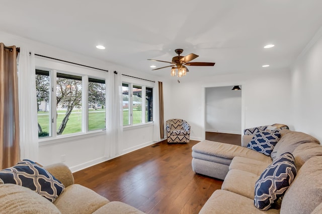 living room featuring recessed lighting, visible vents, baseboards, and wood finished floors