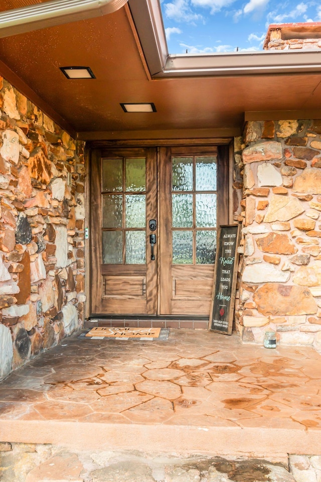 doorway to property featuring french doors