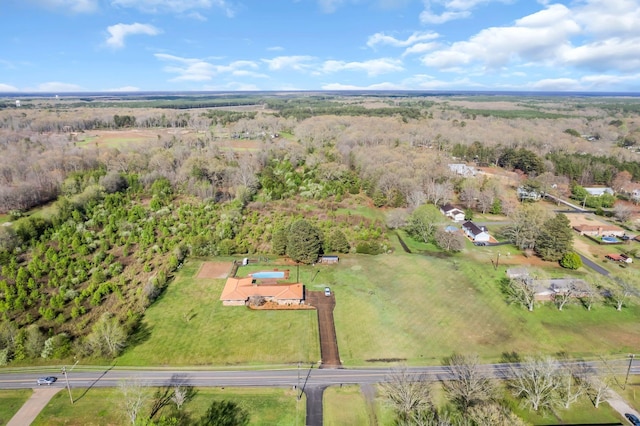 aerial view with a wooded view