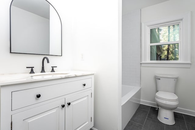 full bath with tile patterned flooring, baseboards, vanity, and toilet