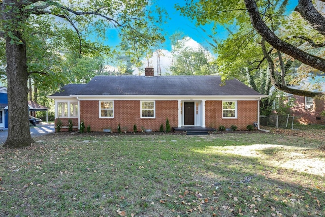 ranch-style house with brick siding, a chimney, crawl space, fence, and a front lawn