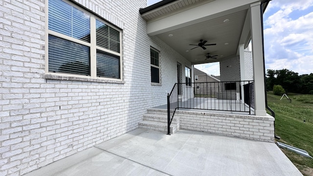 view of patio featuring a ceiling fan