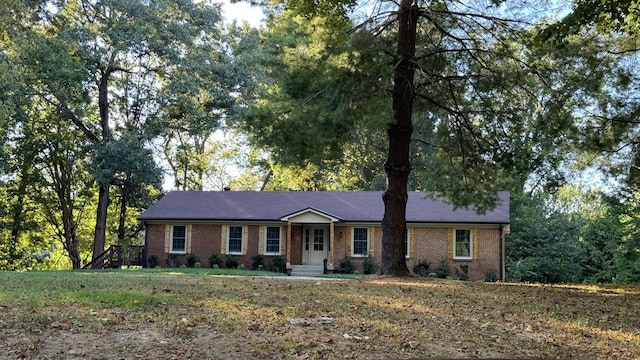 ranch-style home with brick siding