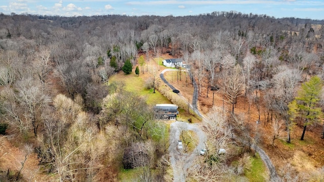 drone / aerial view with a view of trees