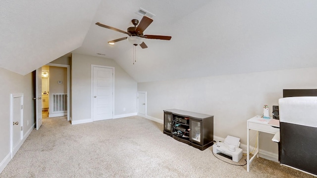 bonus room with visible vents, baseboards, ceiling fan, carpet, and vaulted ceiling