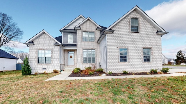 view of front of home featuring crawl space and a front lawn