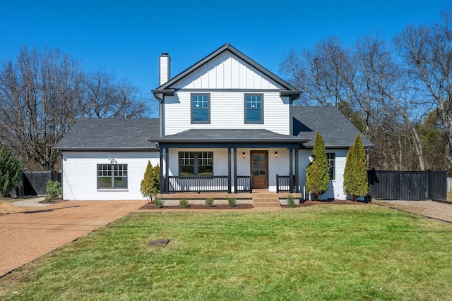 modern inspired farmhouse with a chimney, fence, a porch, and board and batten siding