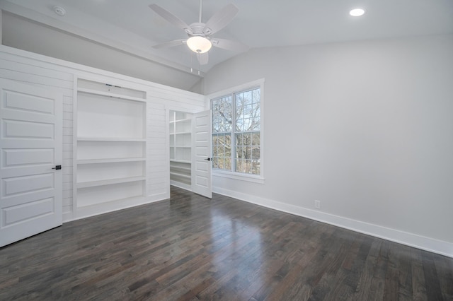 unfurnished bedroom featuring lofted ceiling, recessed lighting, dark wood-style floors, and baseboards