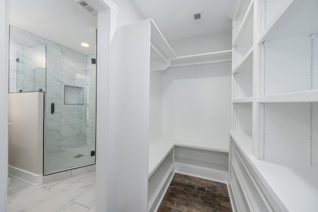 interior space featuring marble finish floor and visible vents